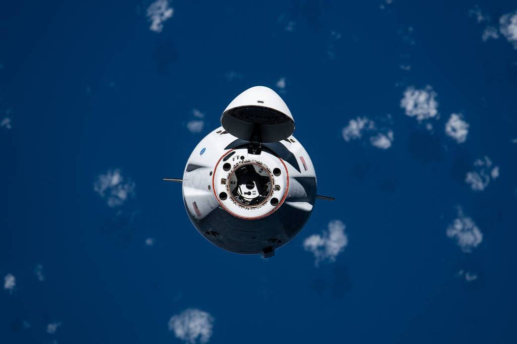 The SpaceX Cargo Dragon approaches the station