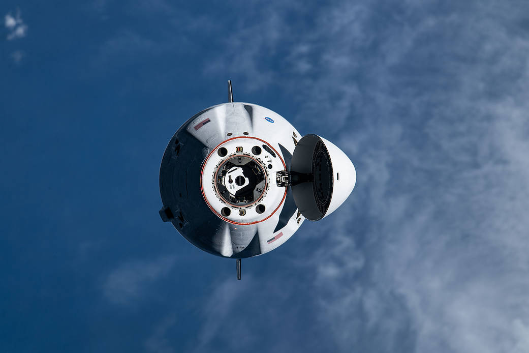The SpaceX Cargo Dragon approaches the station