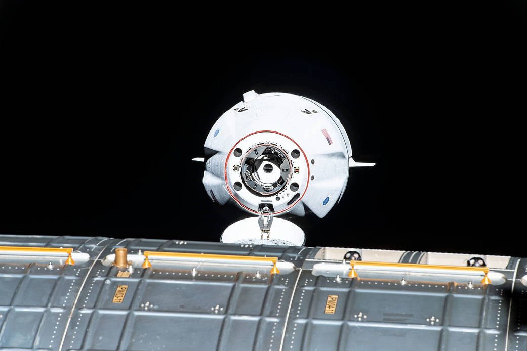 The SpaceX Cargo Dragon approaches the station