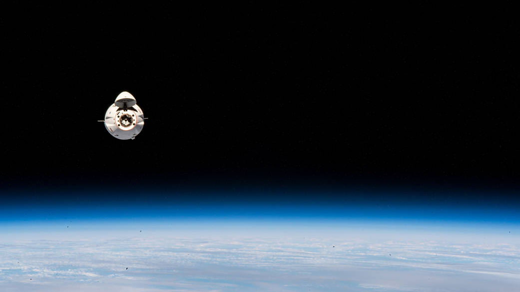 The SpaceX Cargo Dragon approaches the station