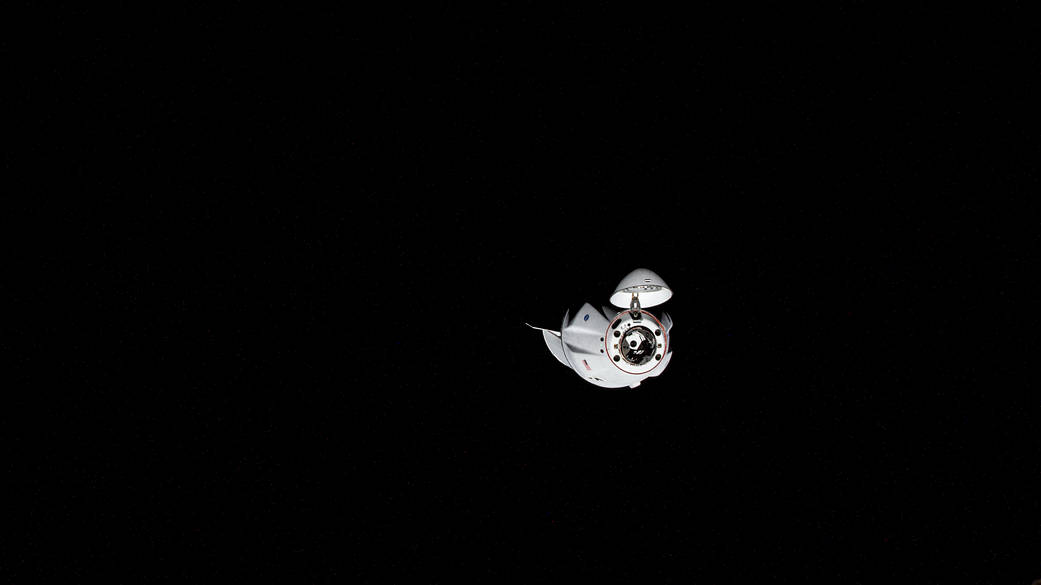 The SpaceX Cargo Dragon approaches the station