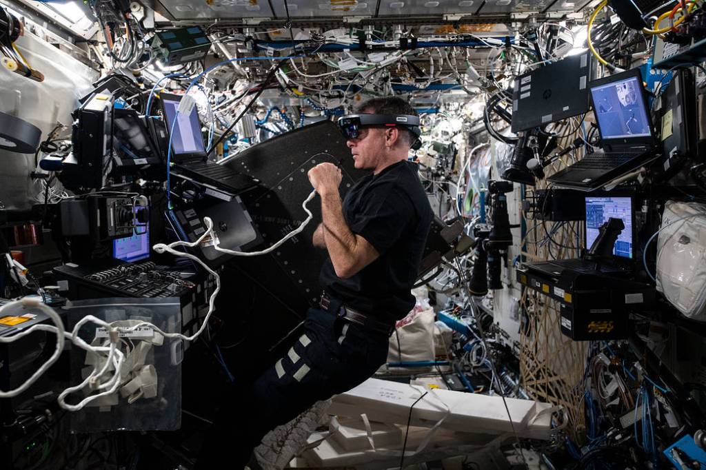 Astronaut Shane Kimbrough wears an augmented reality headset