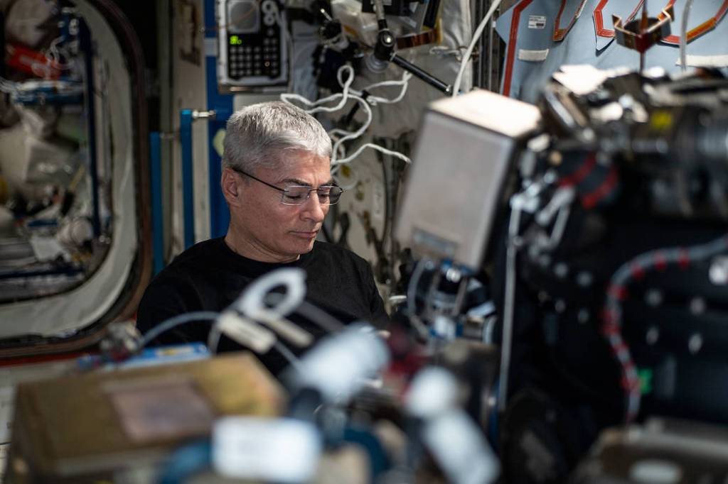 Astronaut Mark Vande Hei works on the Combustion Integrated Rack