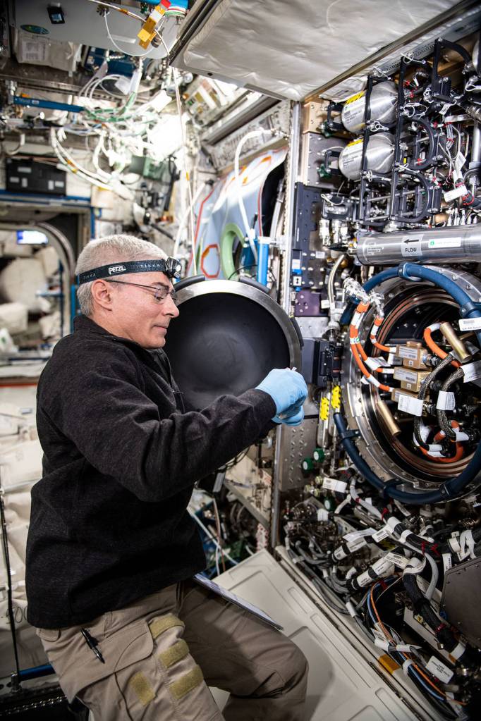 Astronaut Mark Vande Hei works on the Combustion Integrated Rack