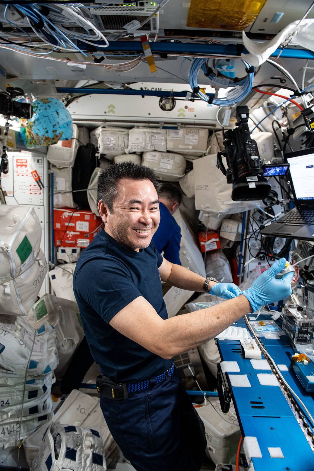 Astronaut Akihiko Hoshide conducts research using DNA sequencing