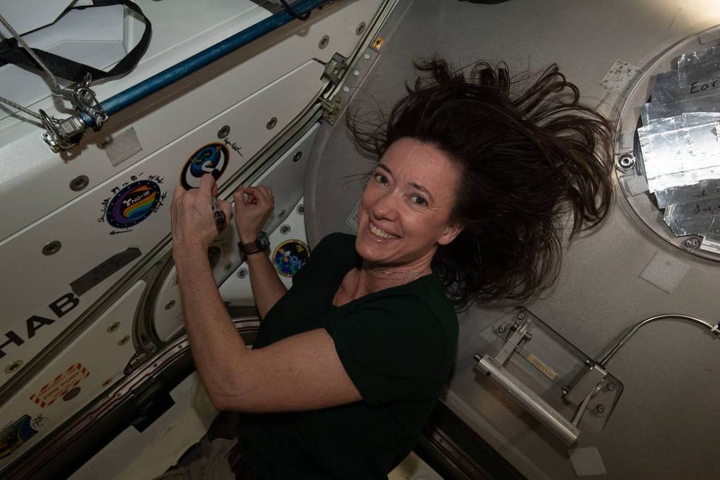 Astronaut Megan McArthur signs the station vestibule