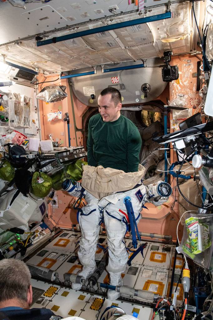 Cosmonaut Pyotr Dubrov tries on the Sokol launch and entry suit