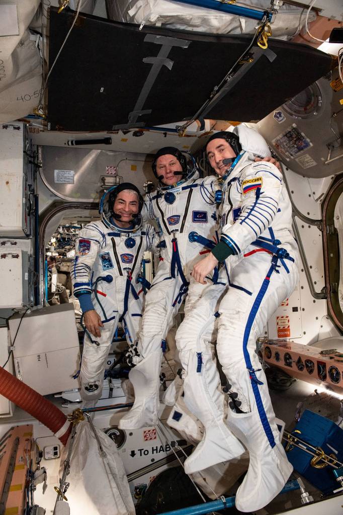 Expedition 65 Flight Engineers try on the Sokol launch and entry suits