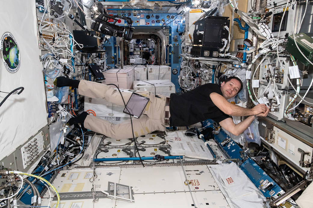 Astronaut Thomas Pesquet installs research hardware