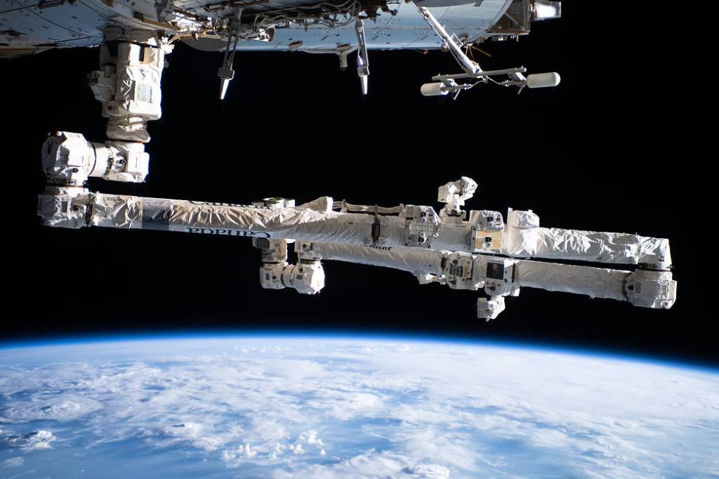 The Canadarm2 robotic arm is attached to the space station