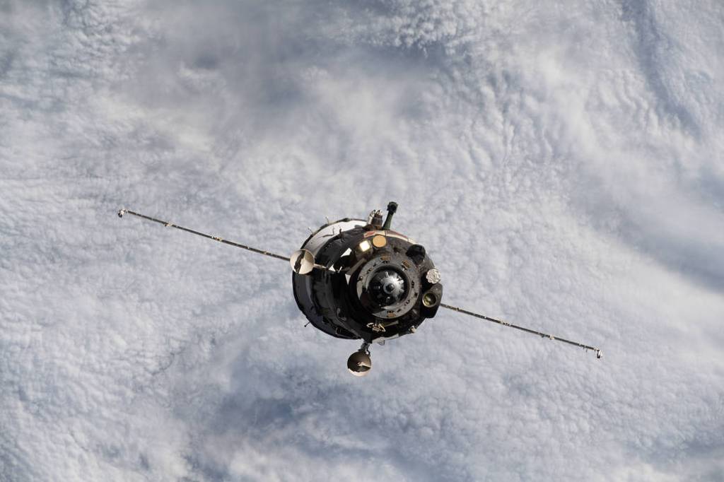 The Soyuz MS-18 crew ship departs the space station