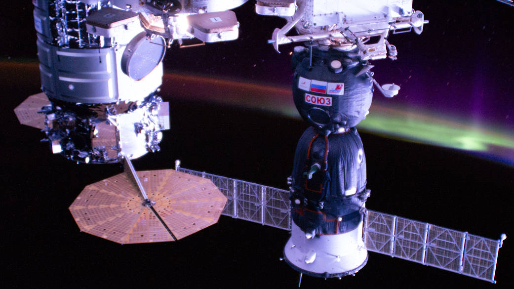 The U.S. Cygnus and Russian Soyuz spaceships docked to the station