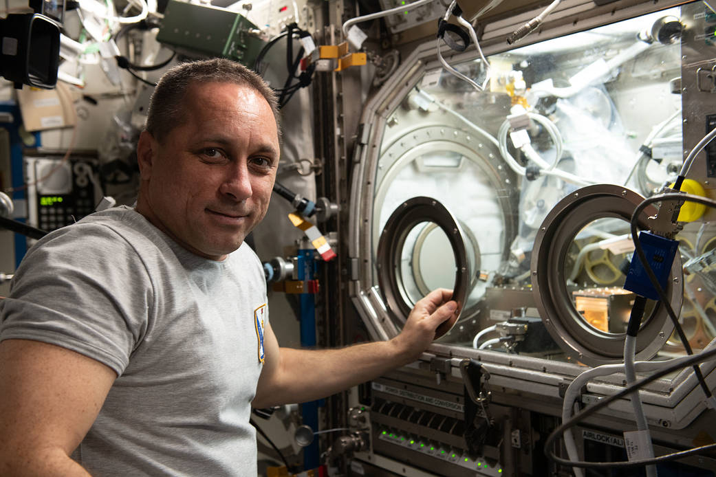 Commander Anton Shkaplerov works on a space physics experiment