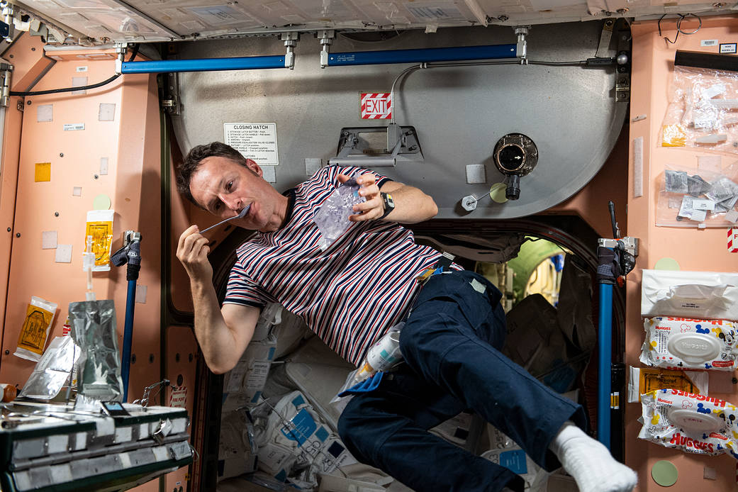 Astronaut Matthias Maurer is pictured during breakfast