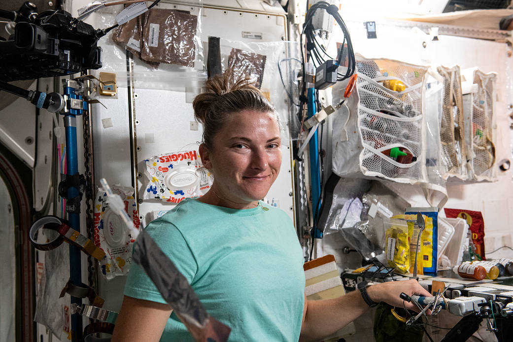 Astronaut Kayla Barron is pictured during breakfast