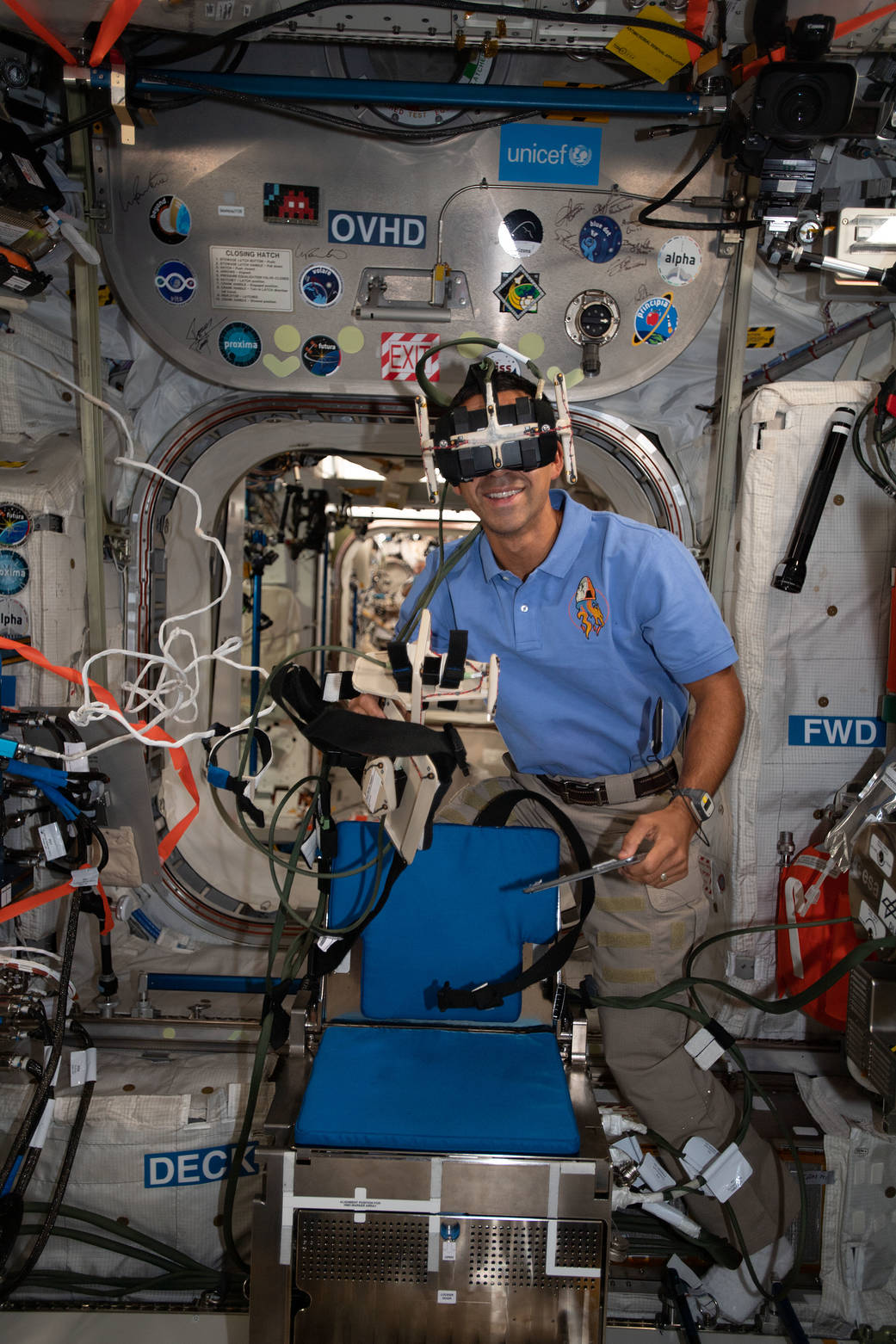 Astronaut Raja Chari wears virtual reality goggles