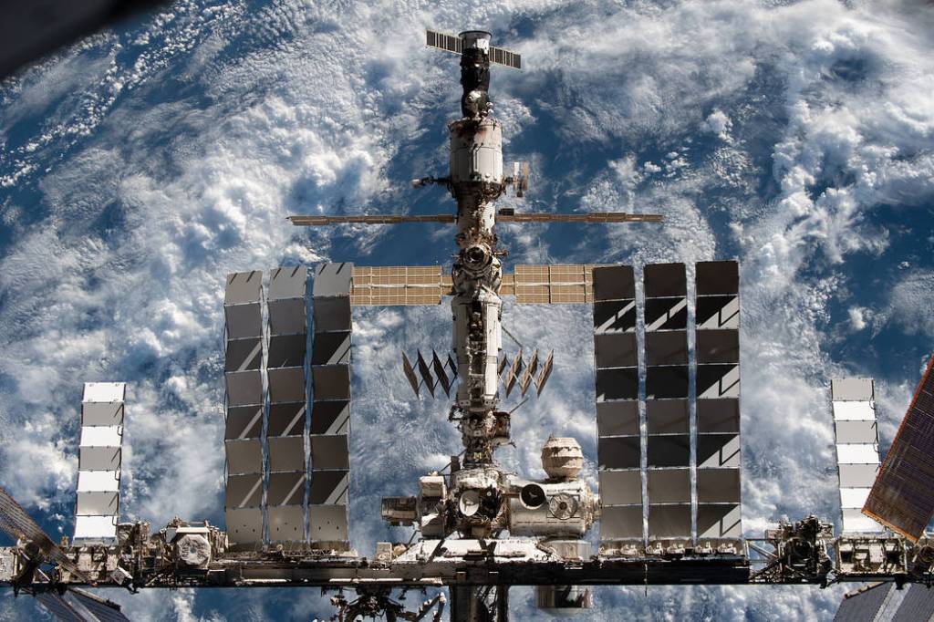 The space station is pictured from the SpaceX Crew Dragon