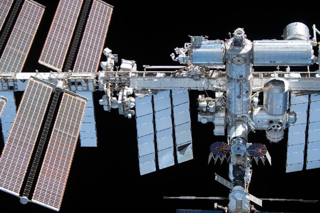 The space station is pictured from the SpaceX Crew Dragon
