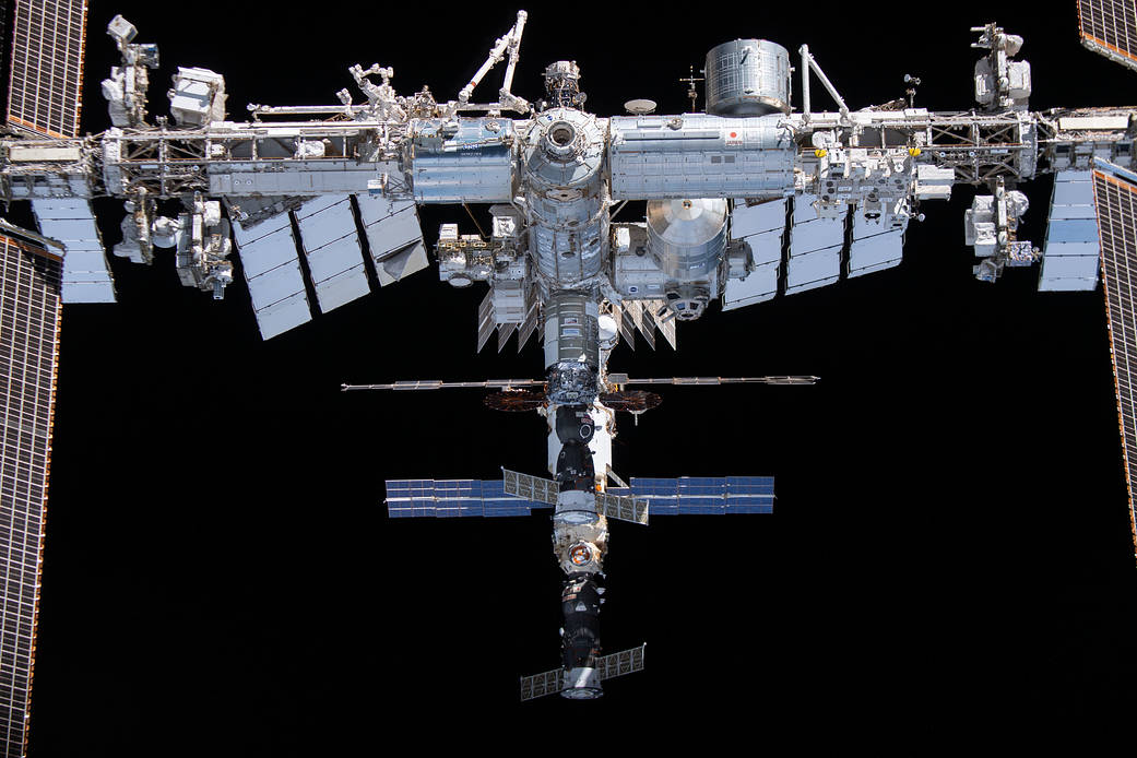 The space station is pictured from the SpaceX Crew Dragon