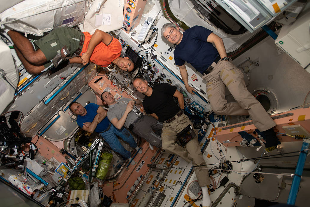 Expedition 66 crewmates pose for a portrait