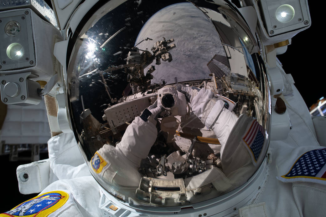 NASA spacewalker Kayla Barron takes a "space-selfie"