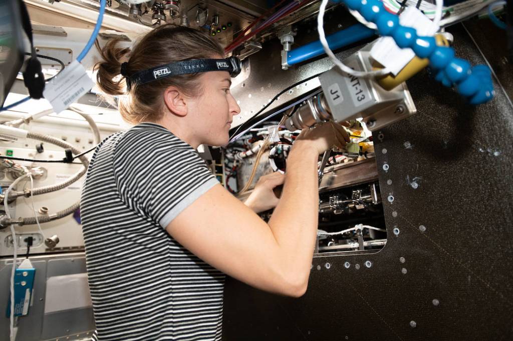 Astronaut Kayla Barron works inside the Materials Science Research Rack