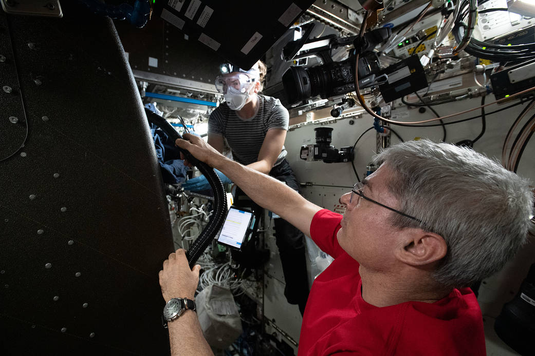 Astronauts Mark Vande Hei and Kayla Barron inspect cables