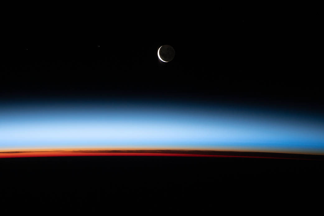 A waxing crescent Moon is pictured from the station