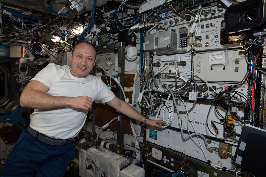 Cosmonaut Alexander Misurkin is pictured next to the Cold Atom Lab
