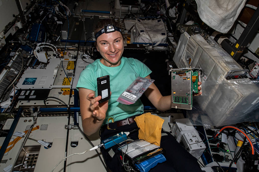 Astronaut Kayla Barron replaces computer hardware