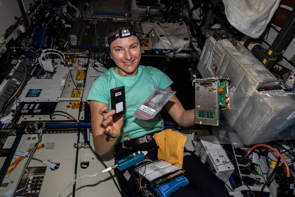 Astronaut Kayla Barron replaces computer hardware