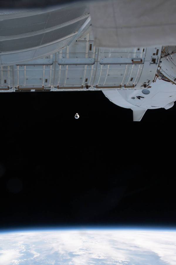 The SpaceX Cargo Dragon approaches the space station