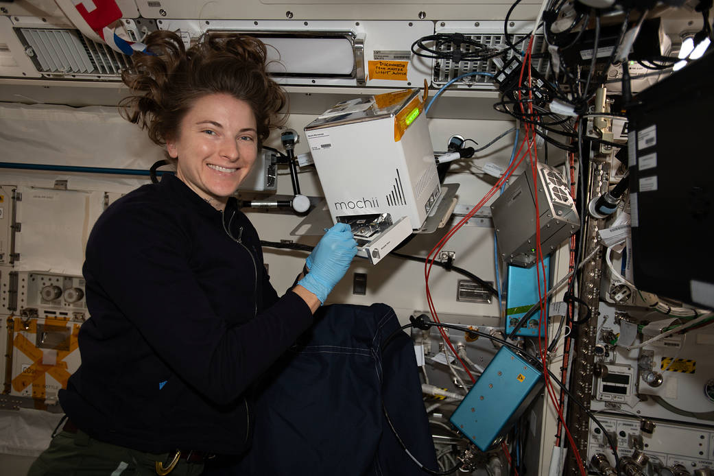 Astronaut Kayla Barron installs the Mochii electron-scanning microscope