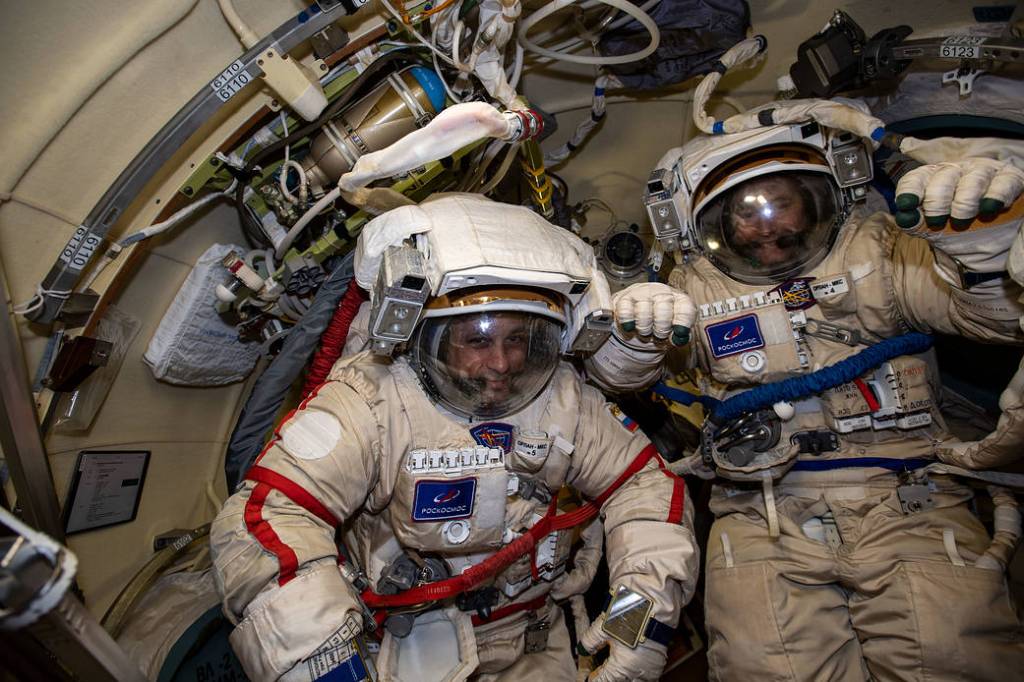 Cosmonauts Anton Shkaplerov and Pyotr Dubrov in their Orlan spacesuits