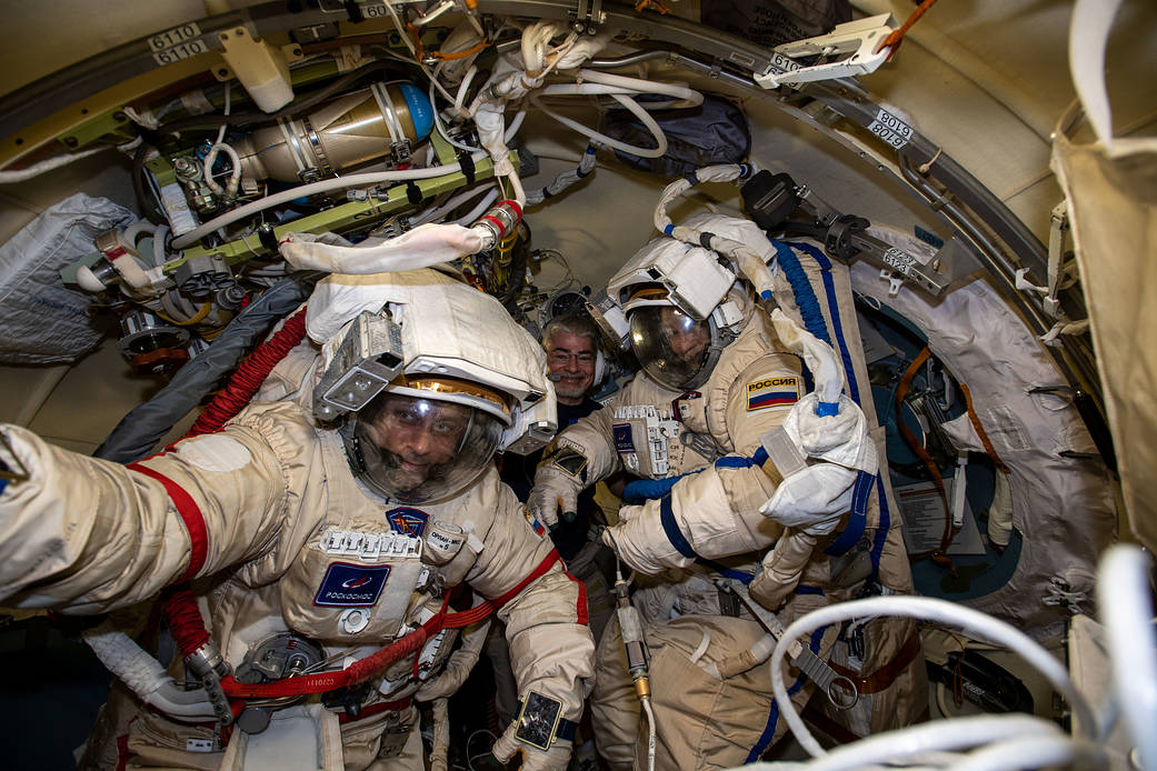 Cosmonauts Anton Shkaplerov and Pyotr Dubrov in Orlan spacesuits