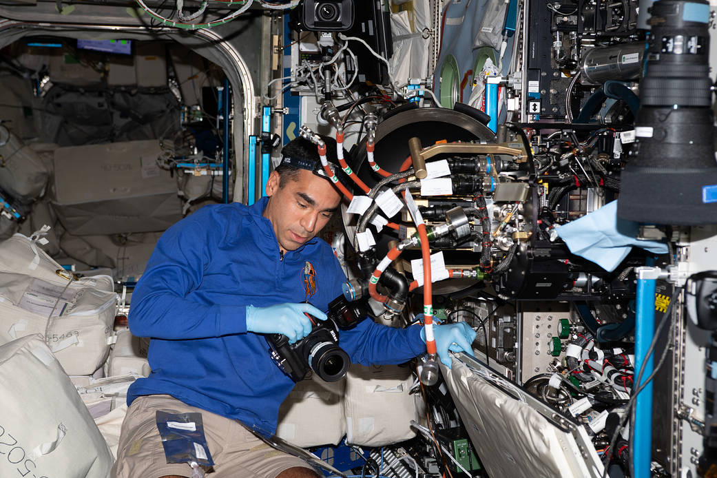 Astronaut Raja Chari replaces combustion research hardware
