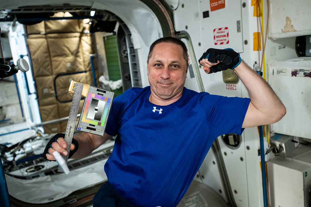 Cosmonaut Anton Shkaplerov poses with gear for the SQuARES study