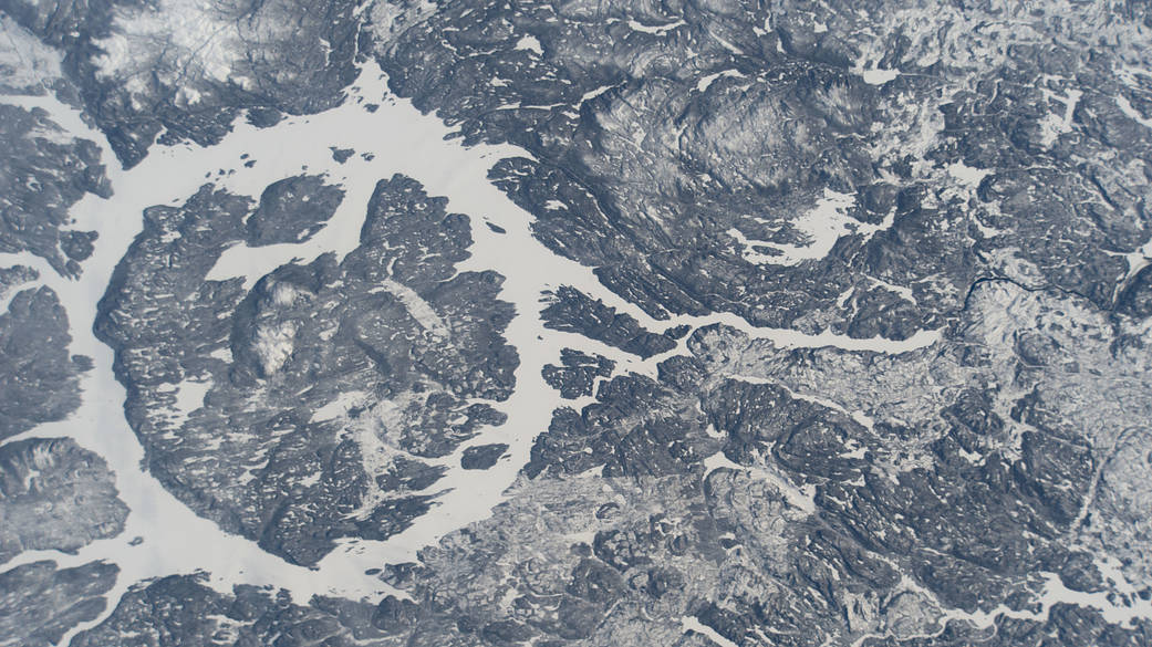 The icy terrain surrounding the Manicouagan Reservoir