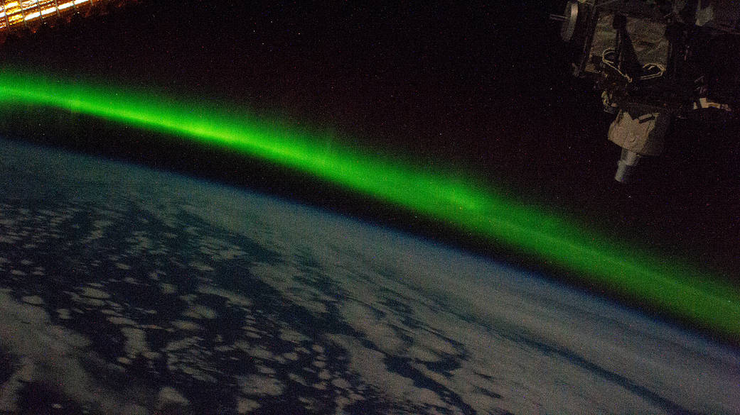 The aurora australis streams above the Indian Ocean