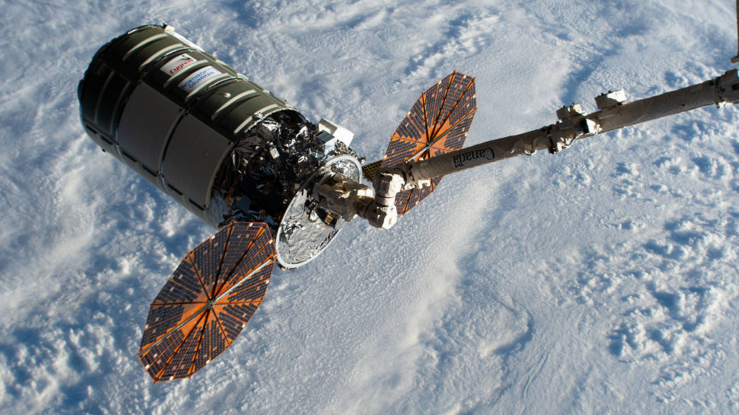 Cygnus in the grip of the Canadarm2 robotic arm
