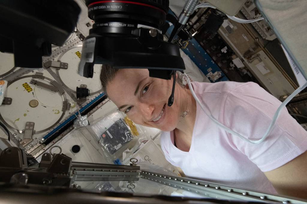 Astronaut Kayla Barron works on a space agriculture study