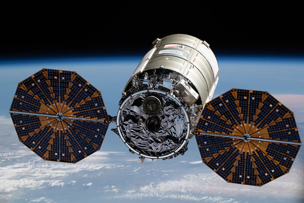 The Cygnus space freighter approaches the space station
