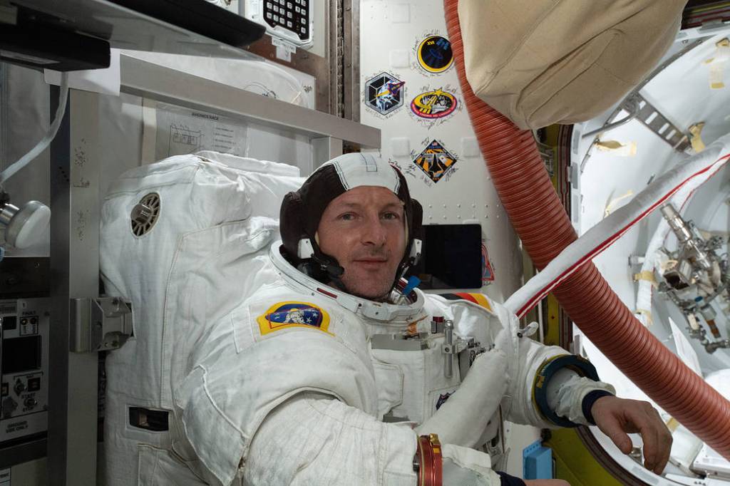 ESA astronaut Matthias Maurer conducts a fit check of his U.S. spacesuit