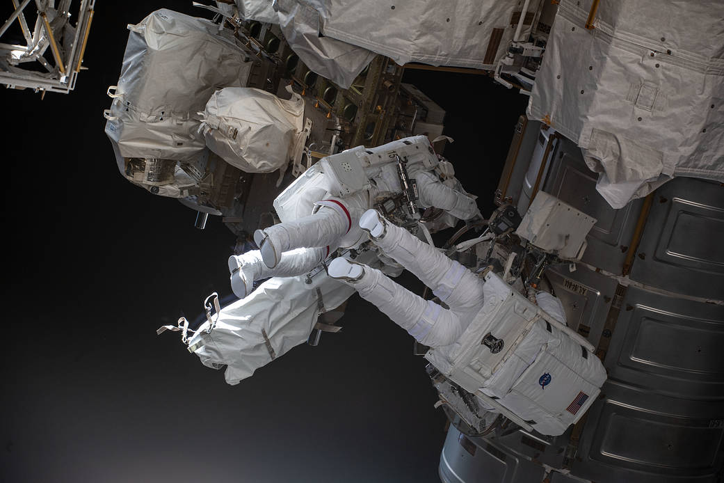 Astronauts Kayla Barron and Raja Chari exit the U.S. Quest airlock
