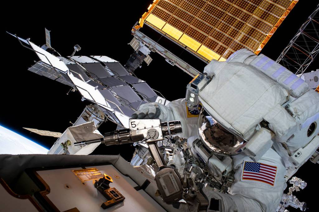 NASA spacewalker Raja Chari is pictured tethered to the station