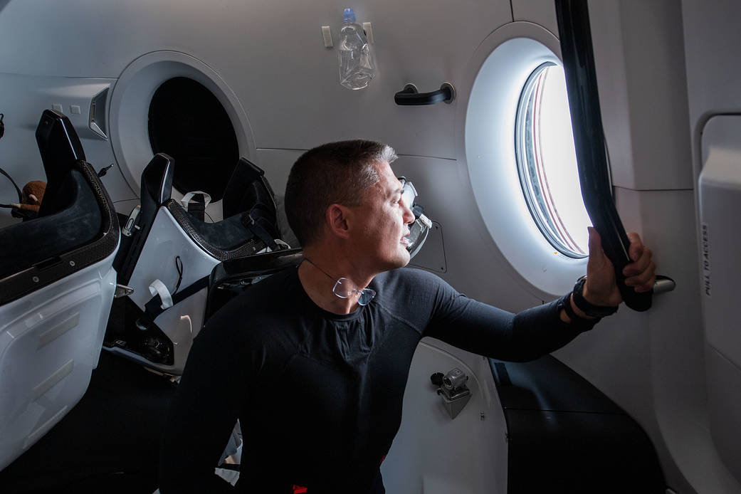 Astronaut Kjell Lindgren inside the SpaceX Dragon Freedom