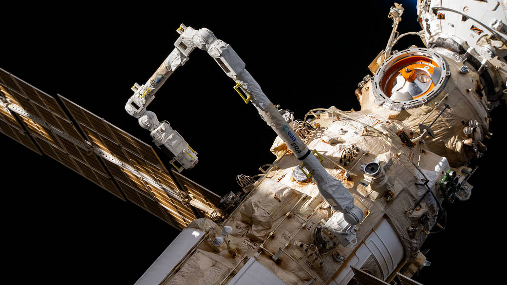 The European robotic arm extends out from the Nauka module