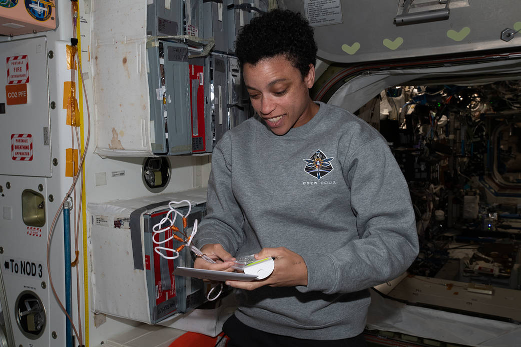 Astronaut Jessica Watkins checks out birthday gifts on the space station