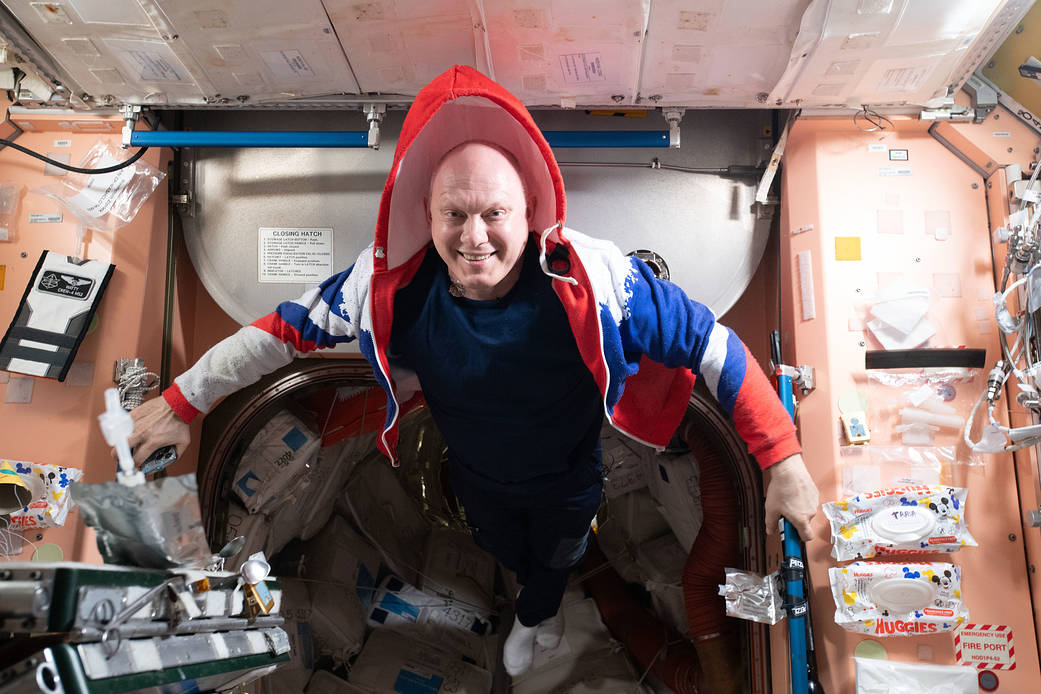 Cosmonaut Oleg Artemyev smiles for a portrait