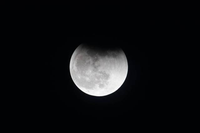 The Moon during a lunar eclipse pictured from the space station